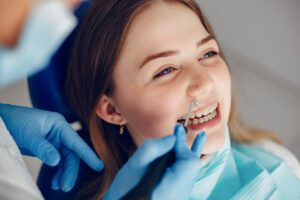 beautiful-girl-sitting-in-the-dentist-s-office.jpg